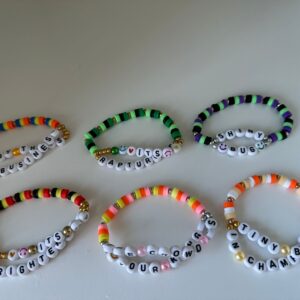 taylor swift the life of a showgirl friendship bracelets with the different album variation names