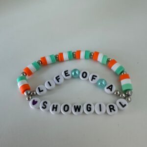 taylor swift the life of a showgirl friendship bracelet in teal and orange colours
